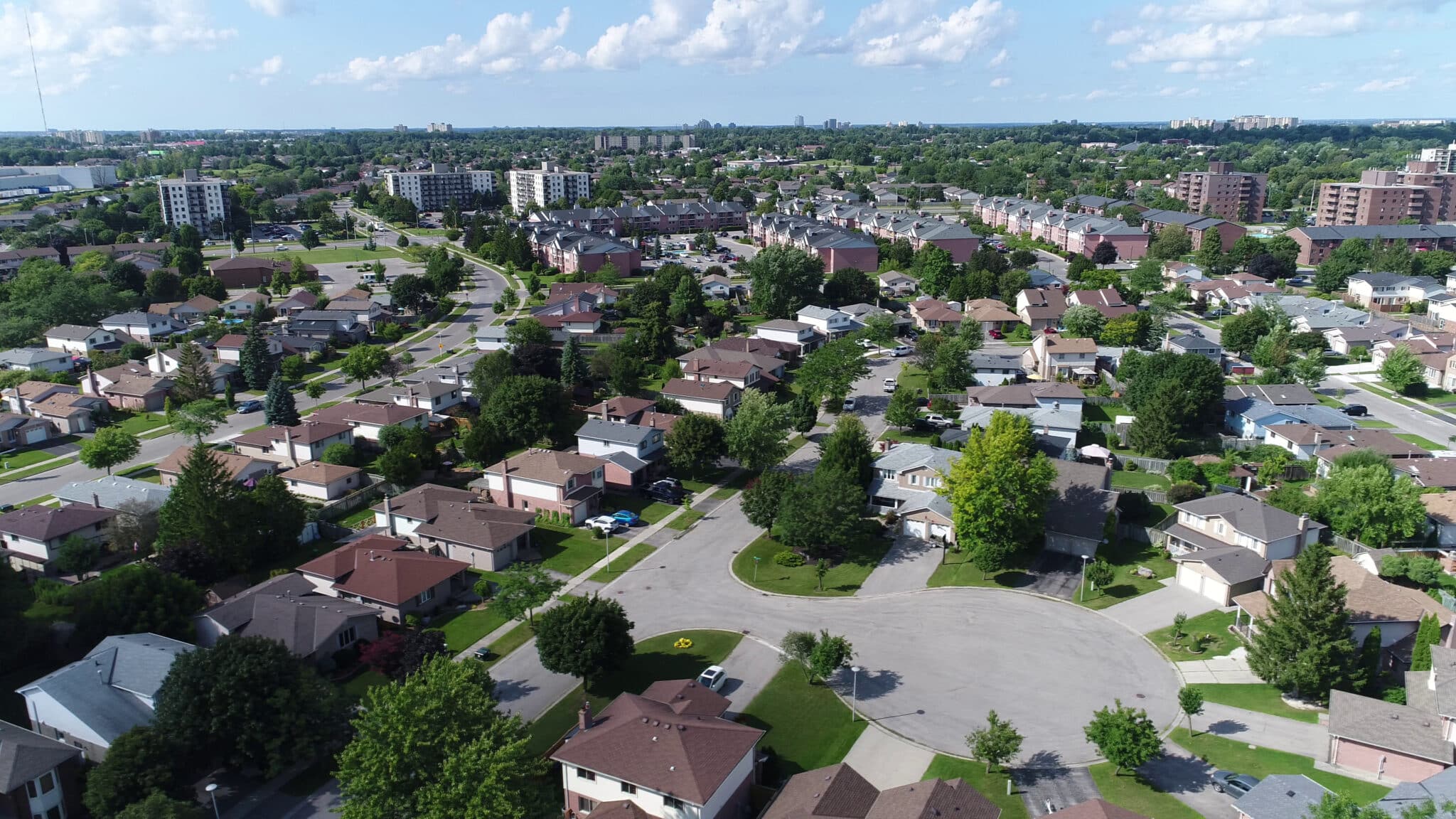 Aerial view of a residential neighborhood in Billings, MT, showcasing homes and green spaces in the area.