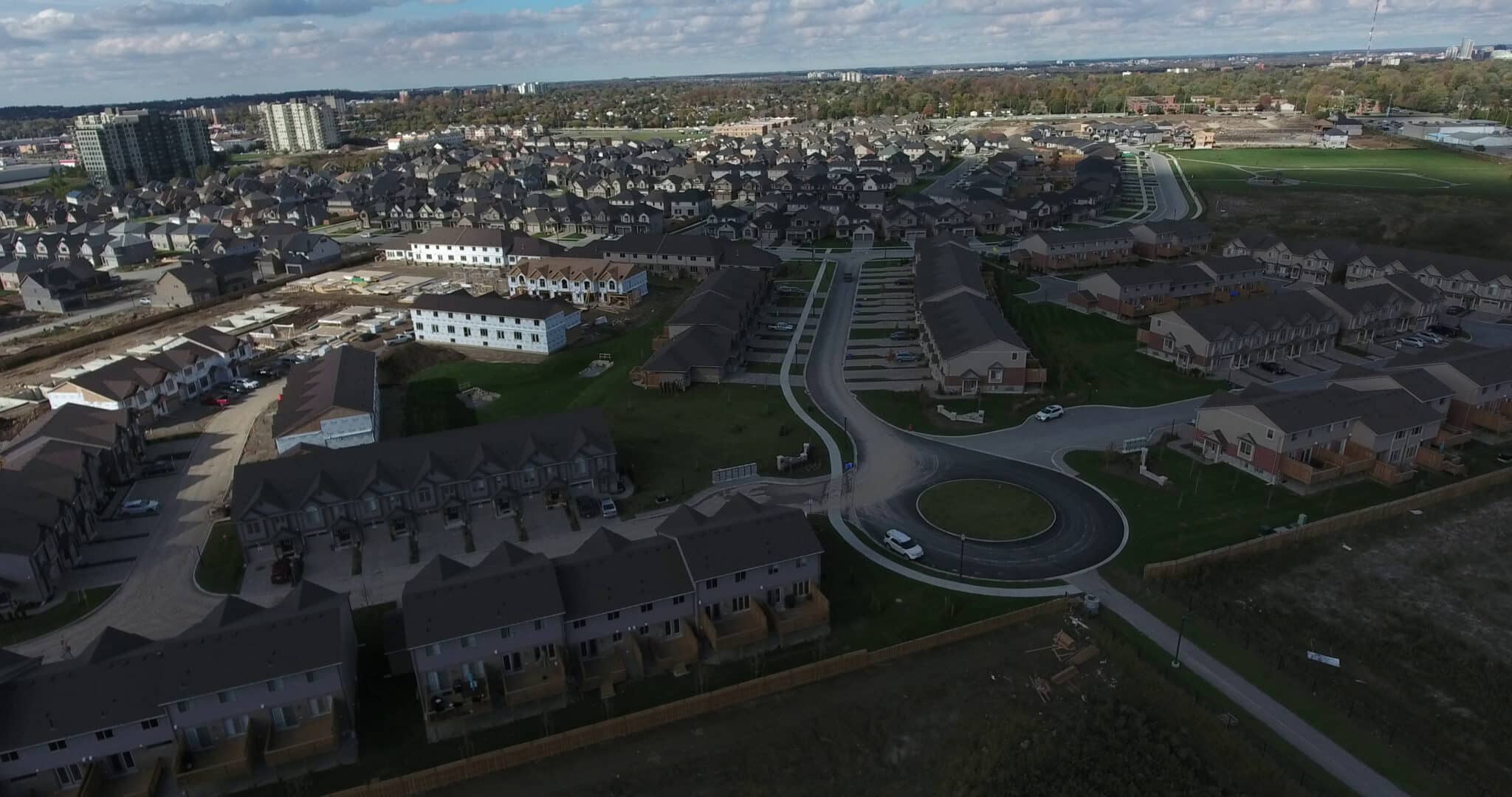 Aerial view of a beautiful residential neighborhood, showcasing homes and streets, relevant to Billings Mt Real Estate.